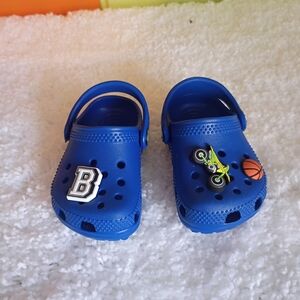 CROCS Kids Royal Blue Clogs with Sports Charms